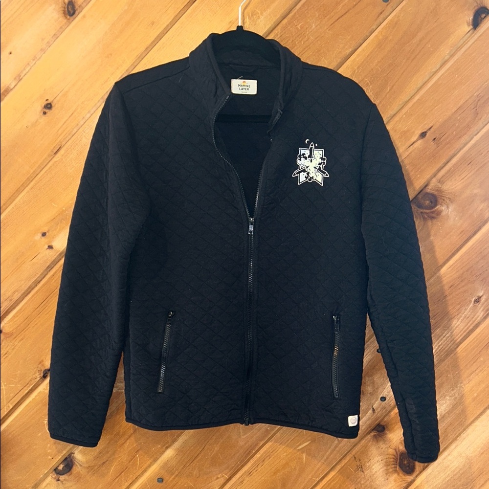 Marine Layer Corbet black quilted jacket with space shuttle patch